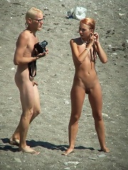 Spy cams film a sunny story of nude fun on a beach...